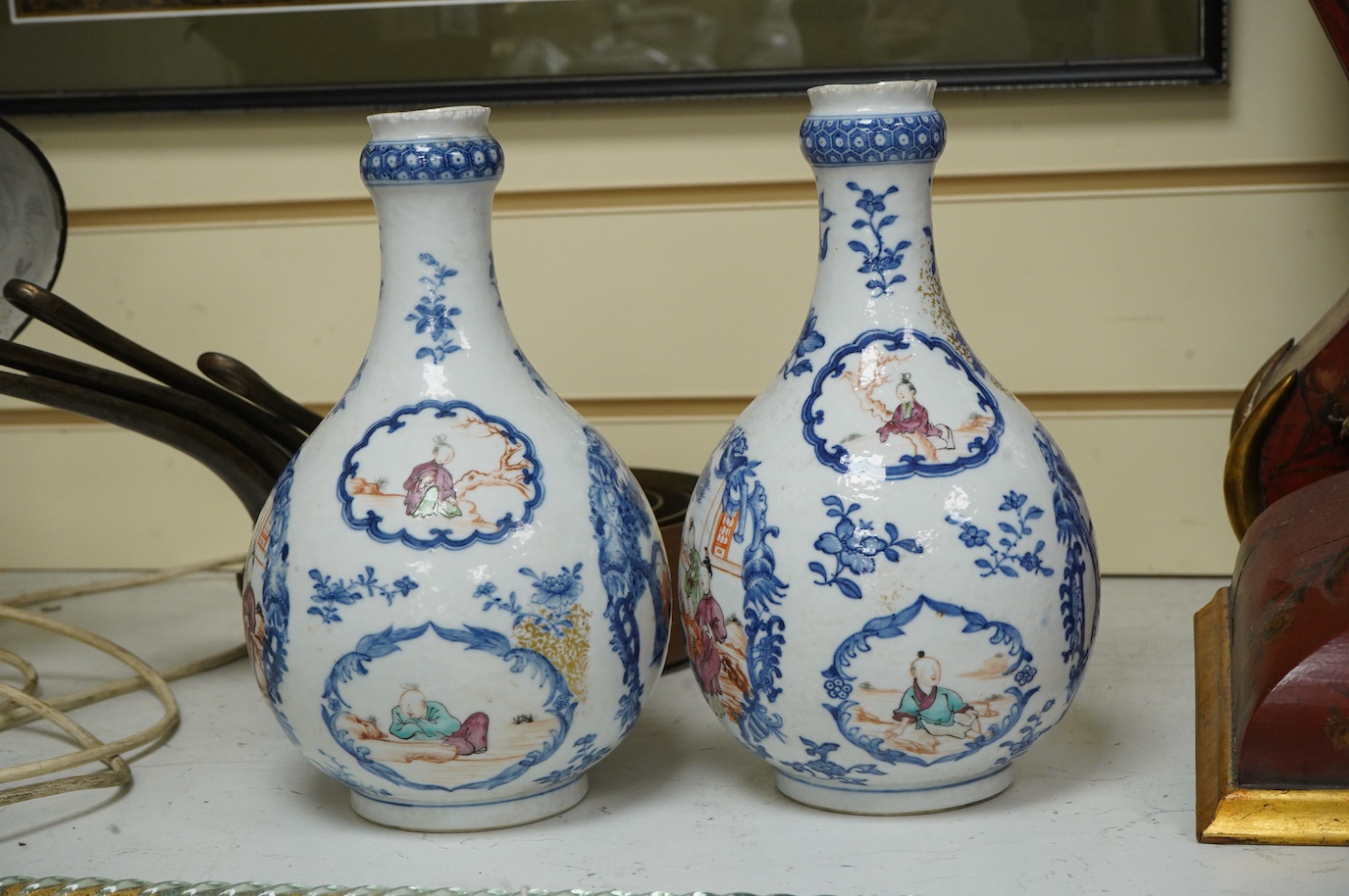 A pair of late 18th century Chinese export Mandarin guglets drilled, 24cm high